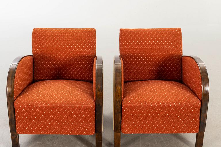 A pair of 1930/40:s Art Deco easy chairs.