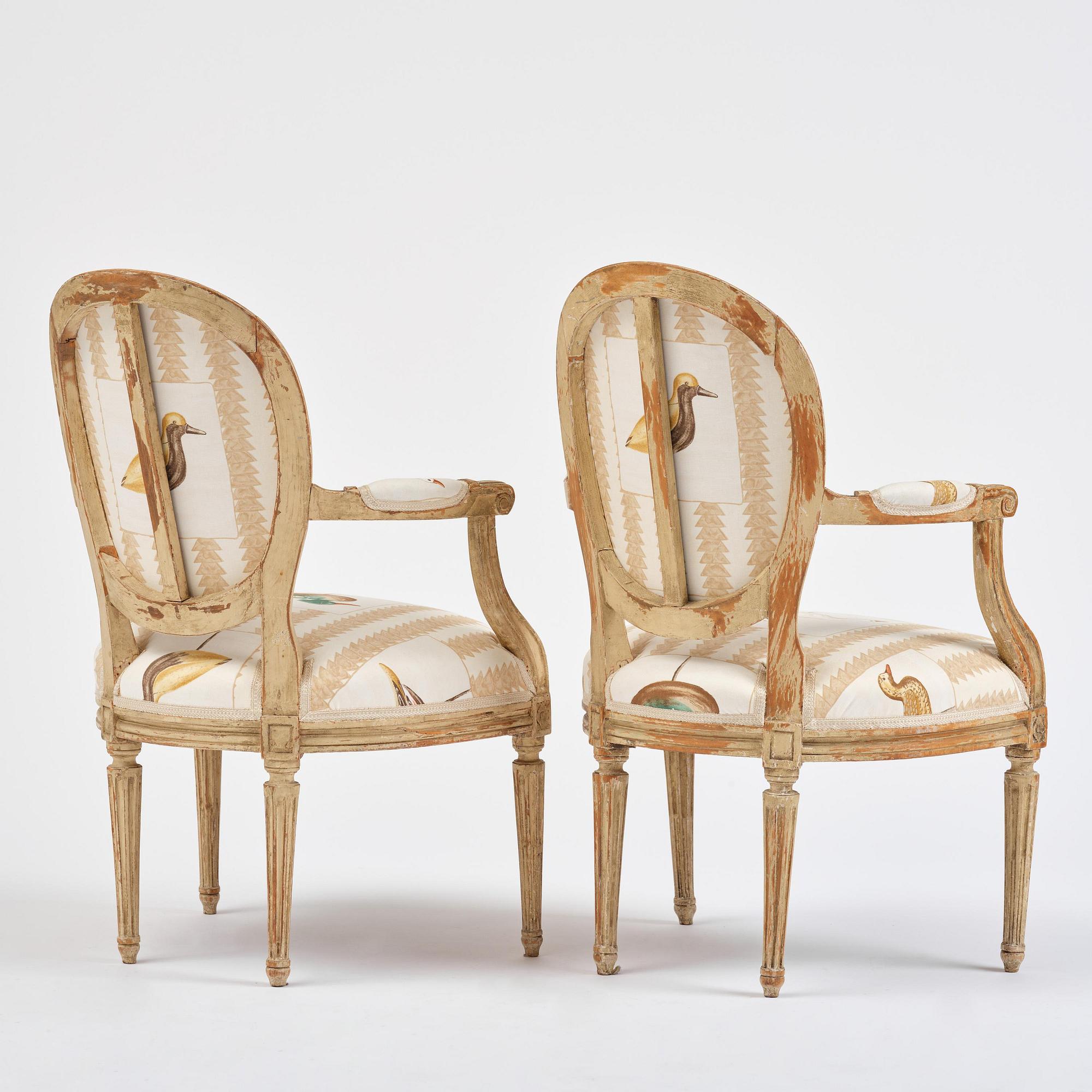 A pair of French Louis XVI children's open armchairs, late 18th century.