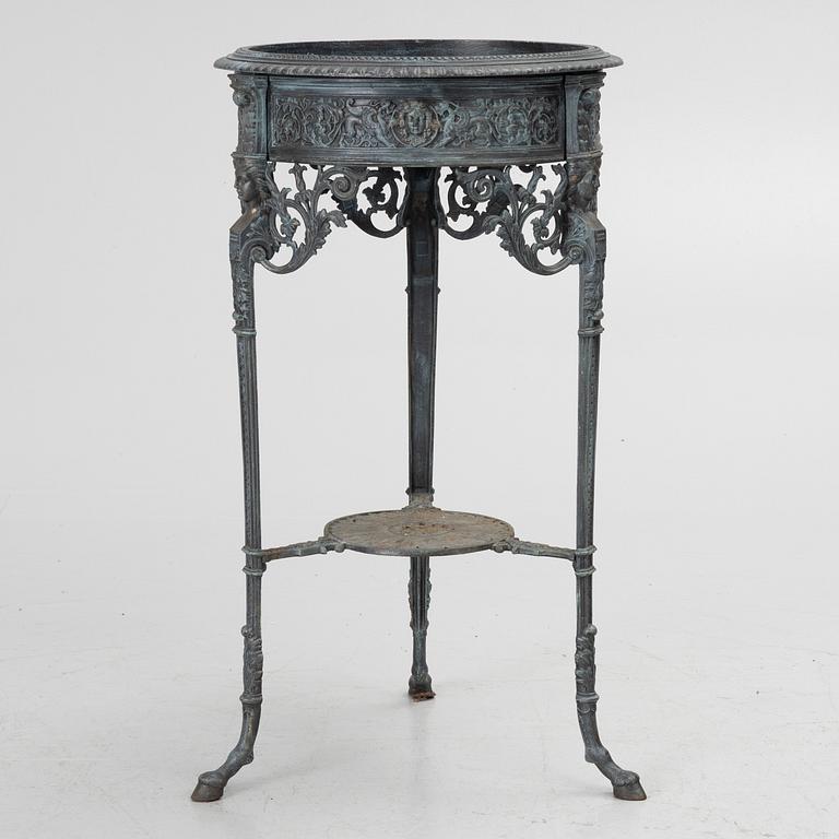 A plant stand, late 20th century.
