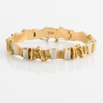 Lapponia garnityr med en collier, ett armband, ett par örhängen och en ring, design Björn Weckström.