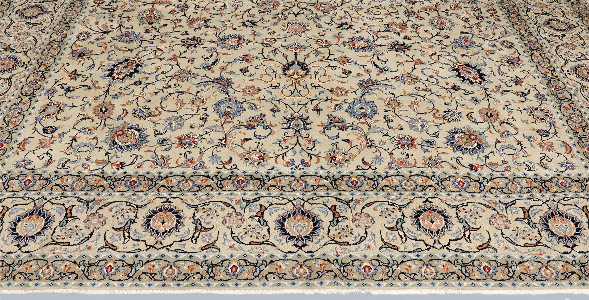 A Keshan carpet, signed, approx. 410 x 323 cm.