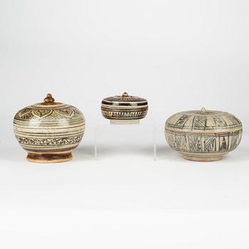 A set of three Sawankhalok jars with covers, Thailand, 14th/17th Century.