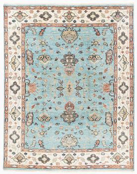 An Agra carpet, c. 302 x 239 cm.