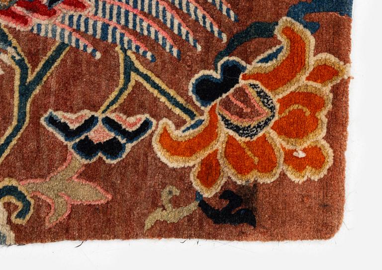An antique 'Khagangma' rug, Tibet, around 1900. c. 74x63 cm.