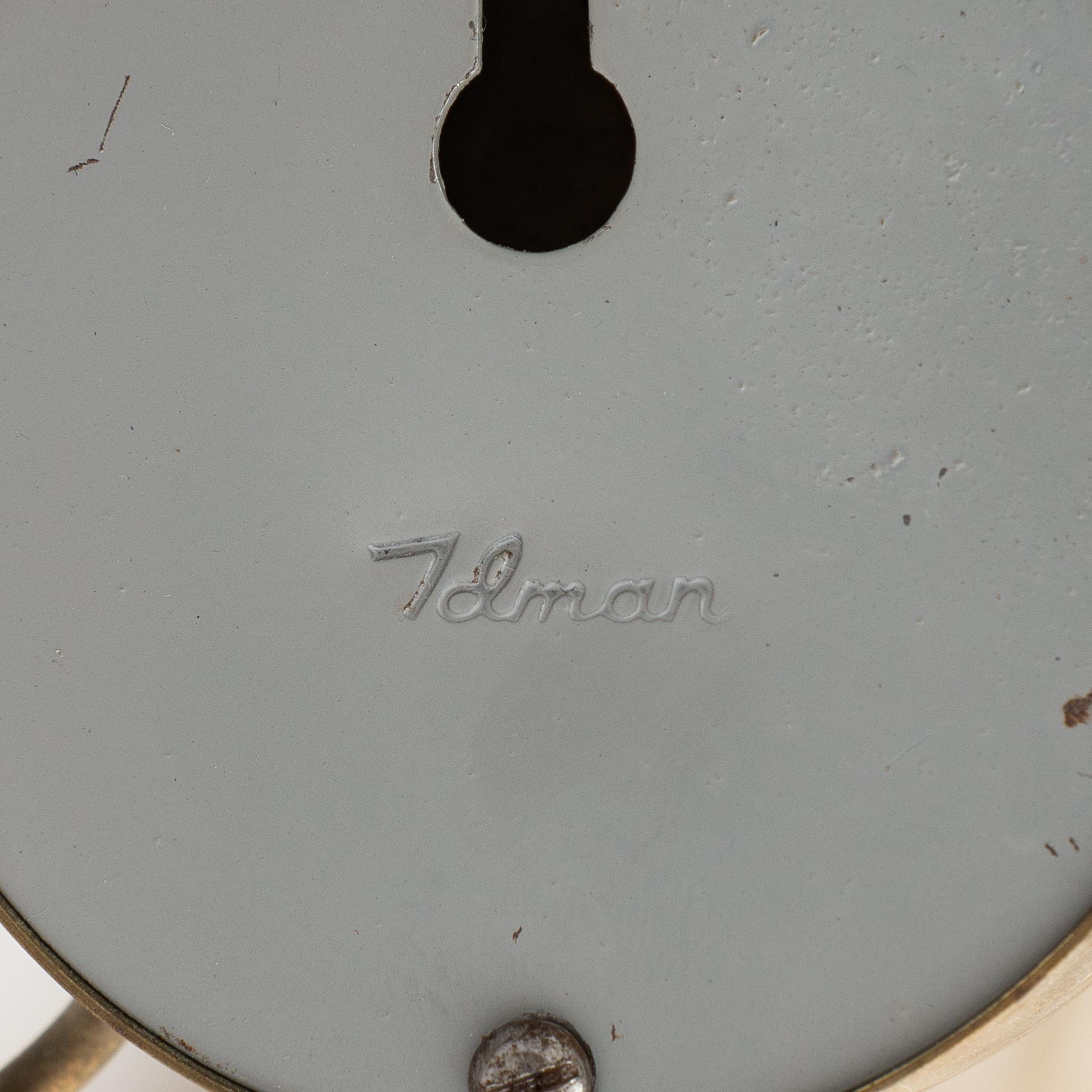 A mid-20th-century table lamp
/wall light for Idman.