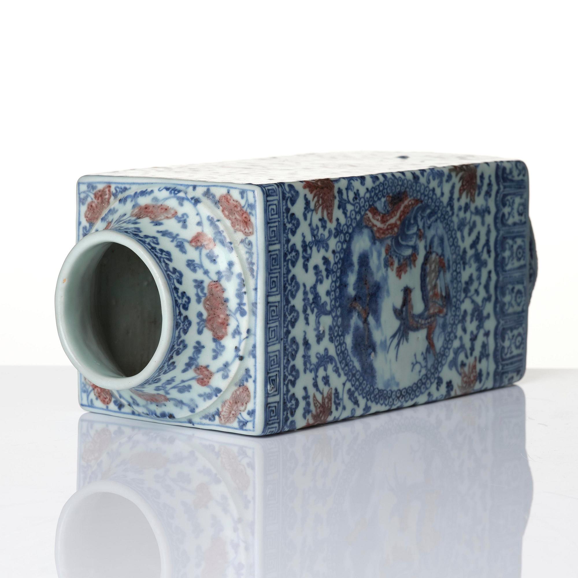 An underglaze blue and copper-red 'crane and deer' cong vase, Qing dynasty, 18/19th century.