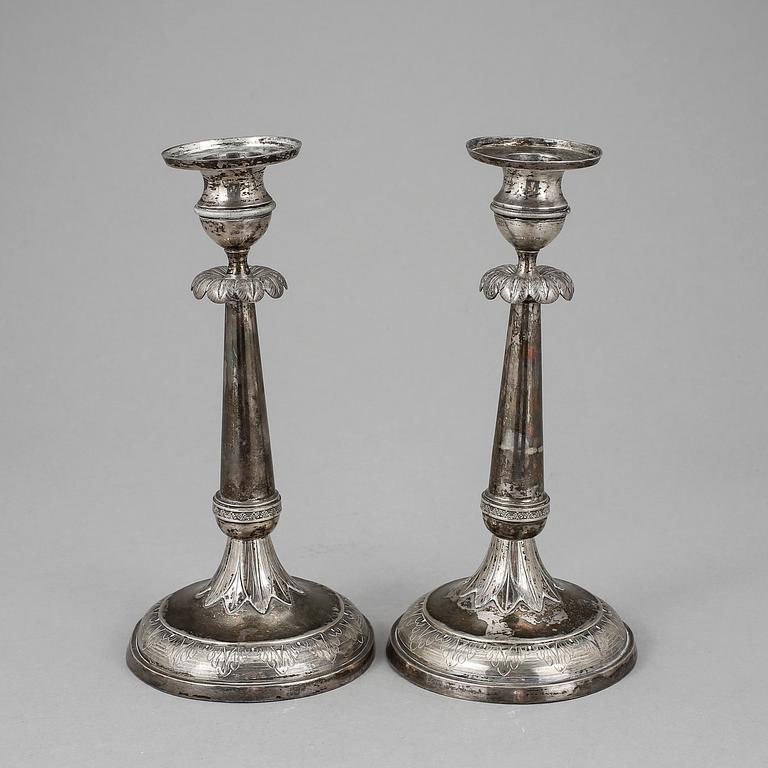 LJUSSTAKAR, ett par, silver, otydliga stämplar, troligen Finland, 1800-tal.