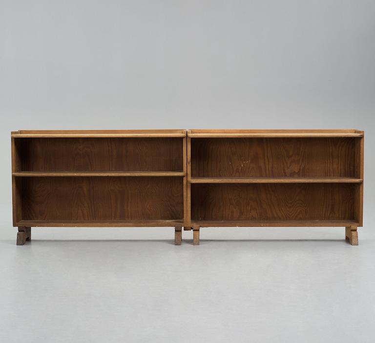 Axel Einar Hjorth, a pair of stained pine book cases "Sport", Nordiska Kompaniet, Sweden 1930's.