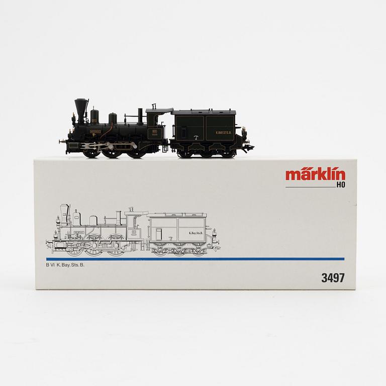 Märklin, a steam locomotive 3497 and car set no 4897, in boxes.