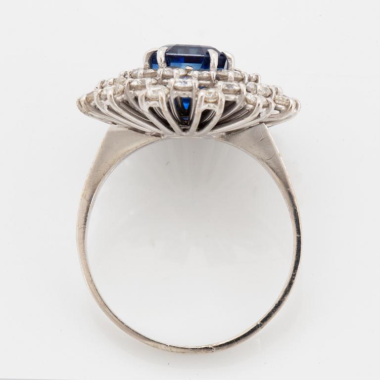 A sapphire and brilliant cut diamond ring.