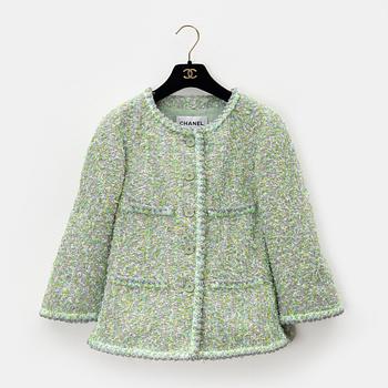 Chanel, a green and silver bouclé jacket, 2018, French size 34.