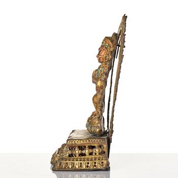 Gudom, förgylld kopparplåt med inläggningar. Nepal, omkring 1900.