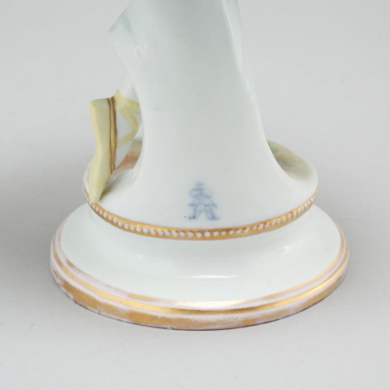 A porcelain figurine by Aelteste Volkstedter Porzellanmanufaktur in Rudolfstadt, made around year 1900.