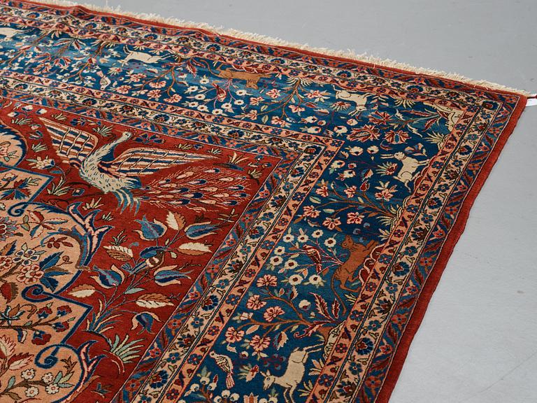 A carpet, a semi-antique Kashan, a so called Dabir, ca 383,5-387,5 x 269,5-275 cm.