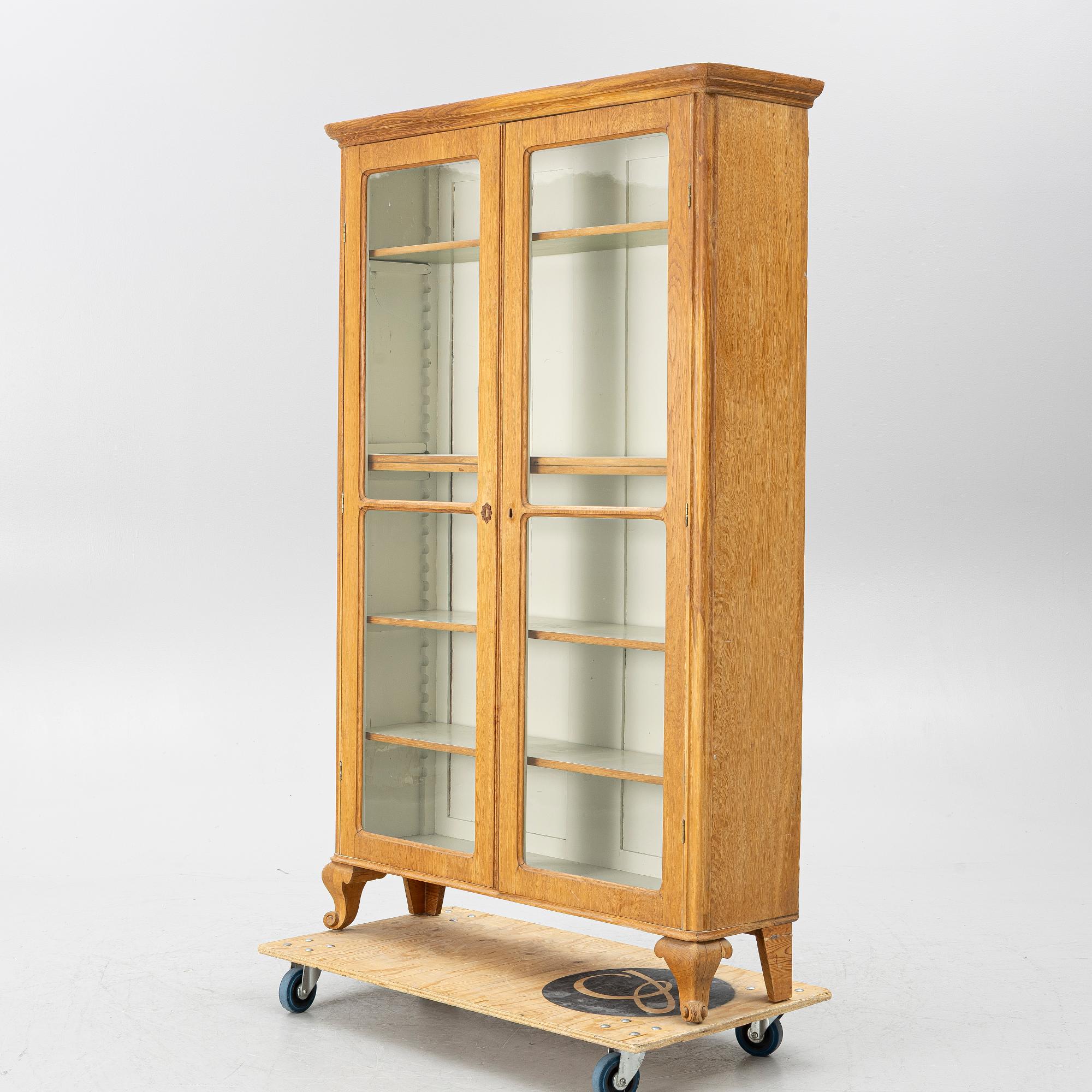 Display cabinet, circa 1900.