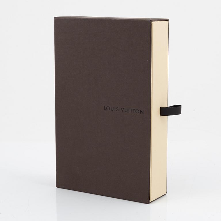 Louis Vuitton, A monogram canvas 'Zippy' wallet, 2009.