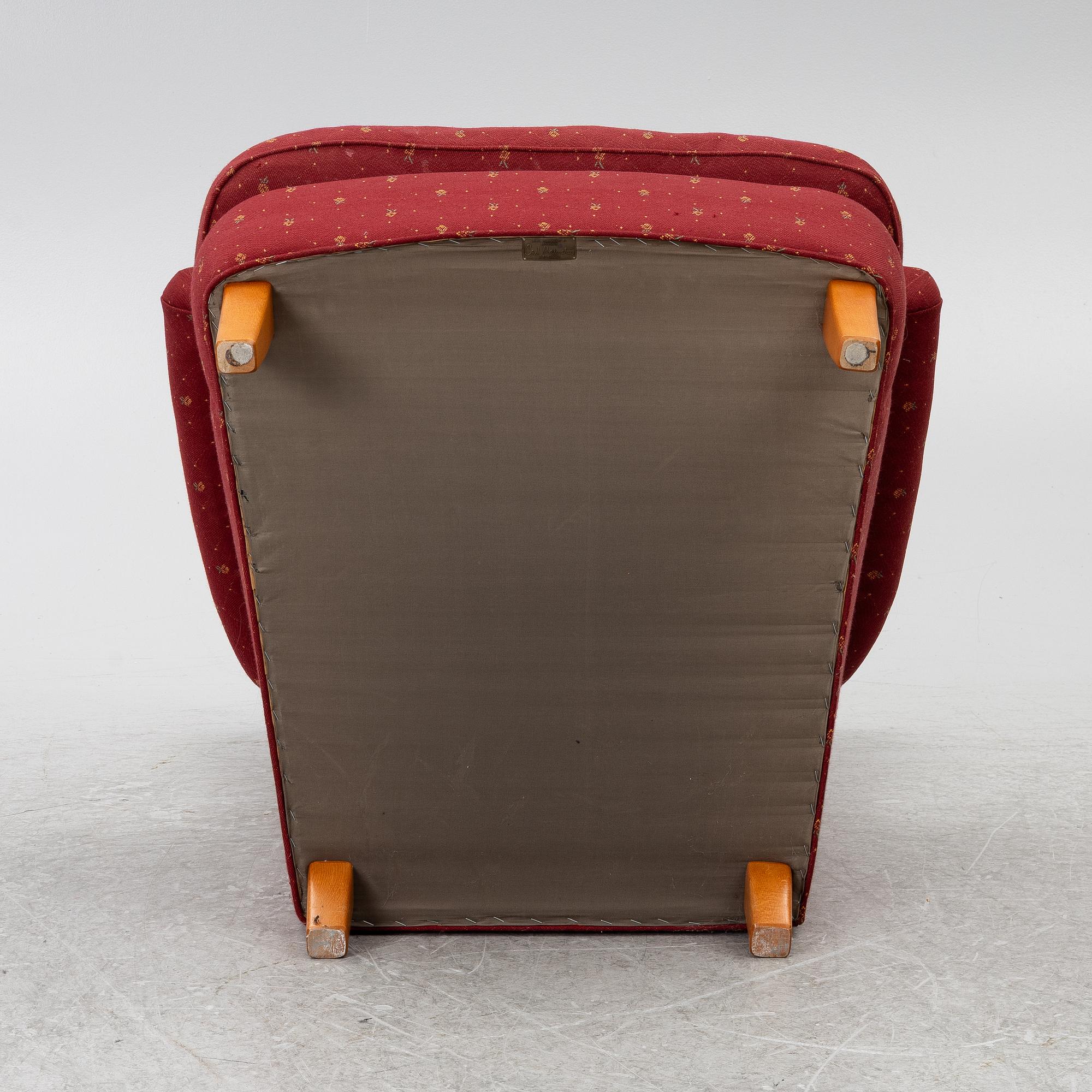 Carl Malmsten, a 'Häggbom' armchair with a 'Jättepaddan' ottoman, AB OH Sjögren, Tranås.