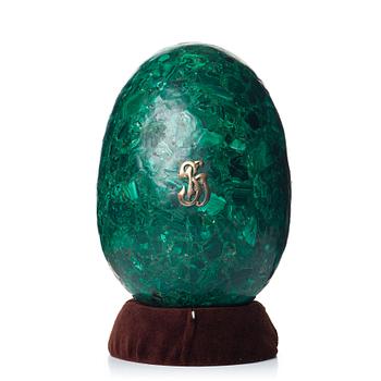 139. A Russian 19th Century malachite veneered egg.