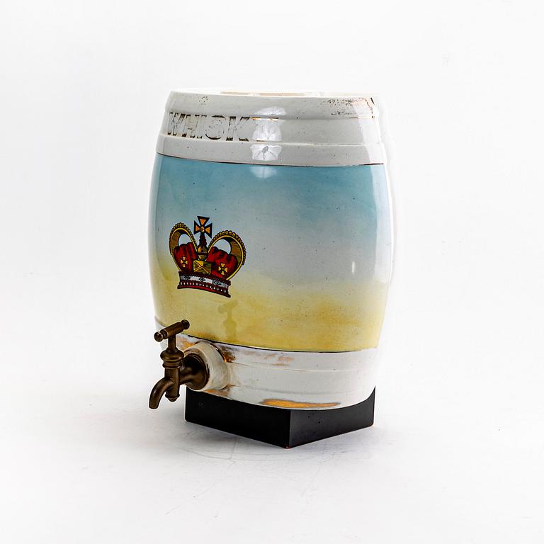 A porcelain whisky-barrel around 1900.