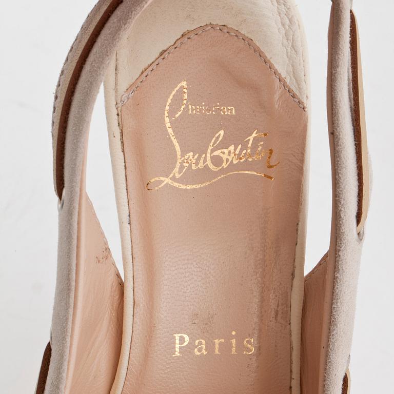 CHRISTIAN LOUBOUTAIN, a pair of grey suede and withe leather slingbacks.