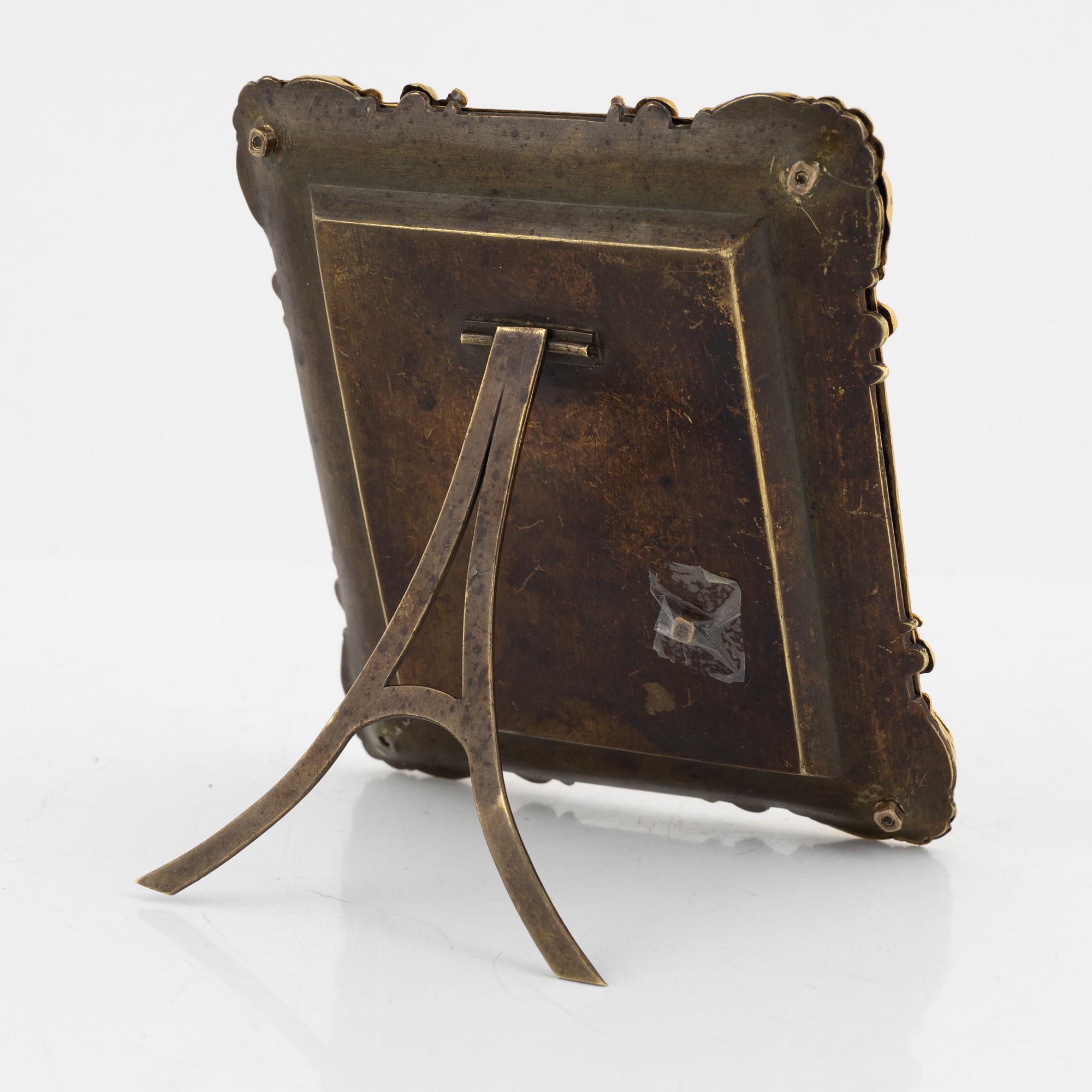 A late Empire ormolu frame with an officer's portrait, 1830's/40's.