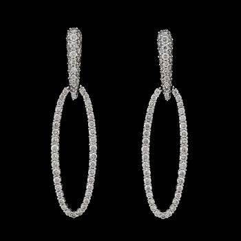 88. A pair of diamond earrings, total carat weight circa 1.50 cts.