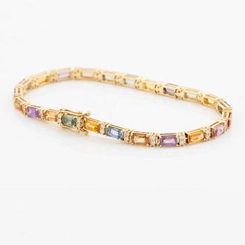 Bracelet 18K gold with multi-coloured sapphires and round brilliant-cut diamonds.