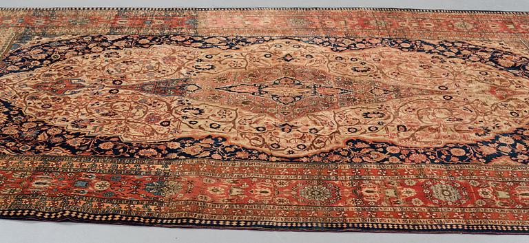 A CARPET, an antique/semi-antique Kashan so called Motachem, ca 333,5-354 x 218-243 cm.