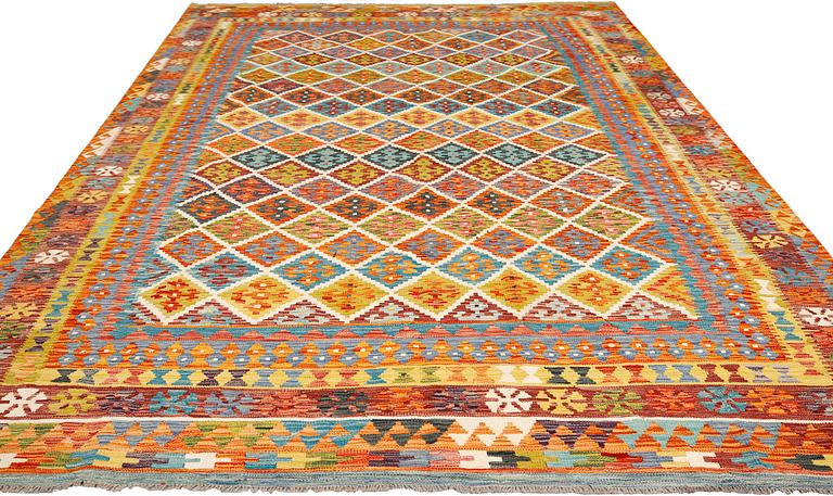 A kilim carpet, approximately 353 x 246 cm.