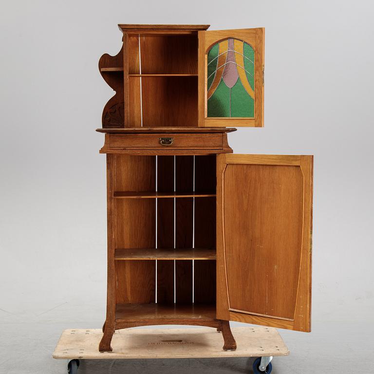 An oak art noveau cabinet, early 20th Century.