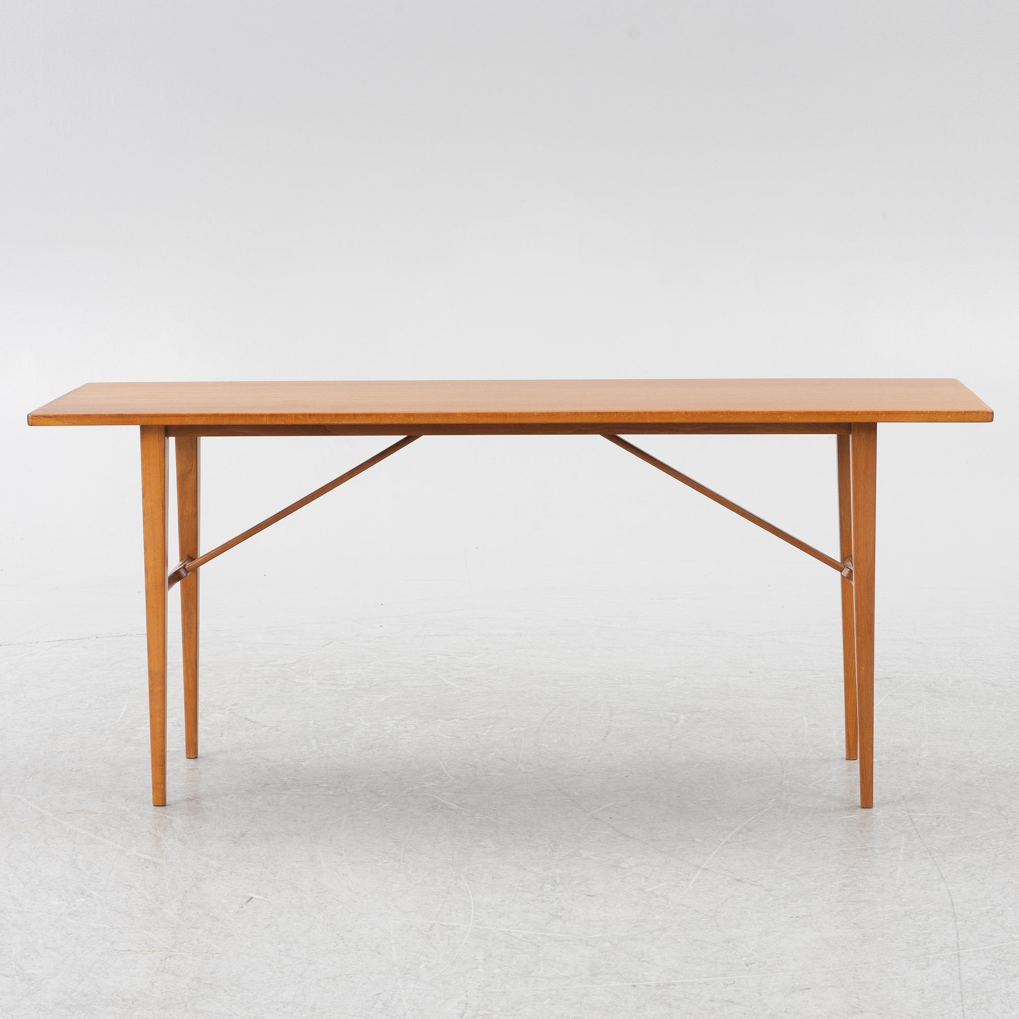 A coffee table/side table, Blomstermåla, circa the mid-20th century.