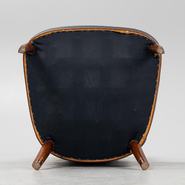 Carl Malmsten, a mahogany 'Advokaten' armchair.