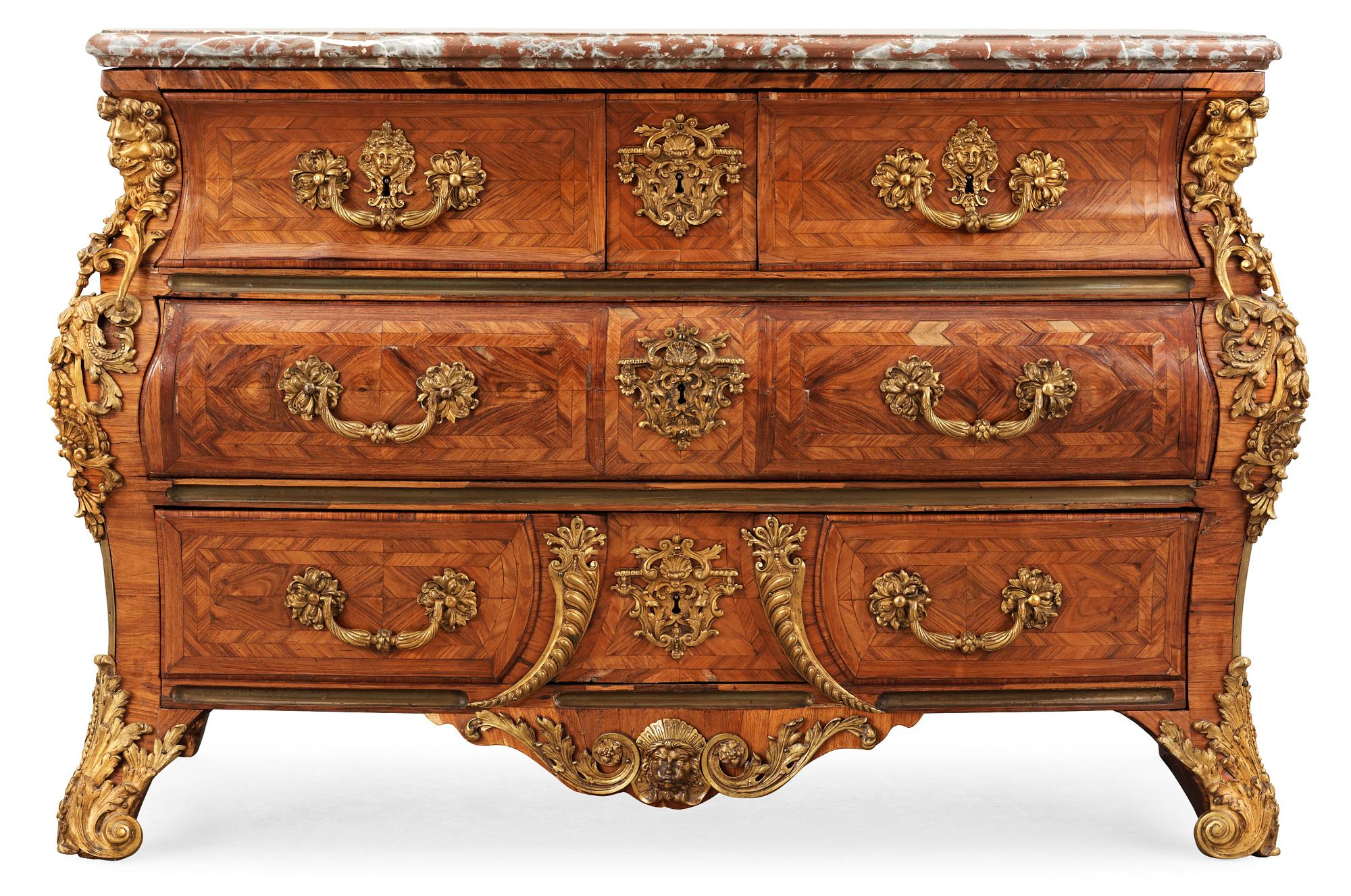 A French Régence 18th century commode in the manner of F. Mondon.