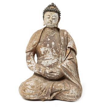 A Southeast Asian figure of a Buddha, 20th century.