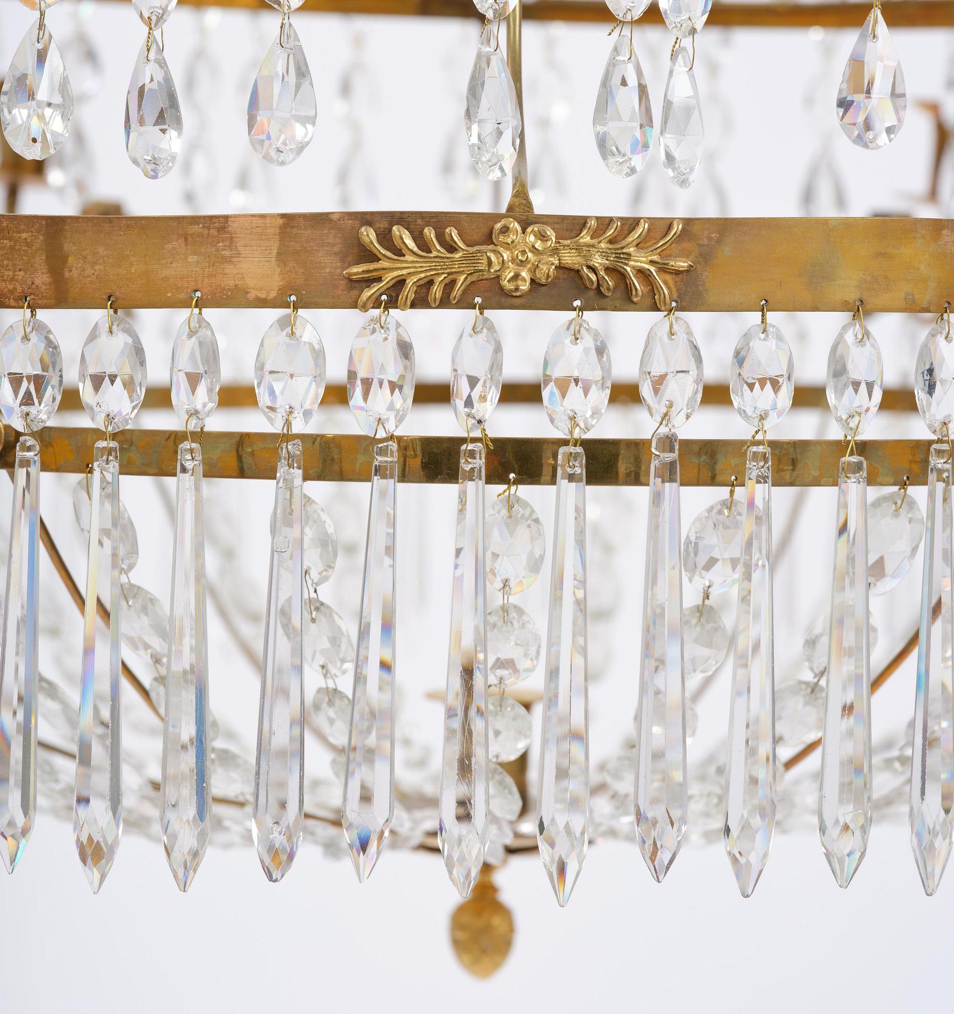 A late Gustavian gilt brass and cut glass seven-light chandelier, Stockholm, late 18th century.