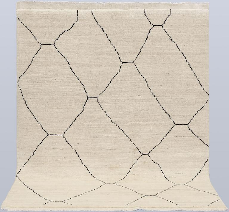 A Moroccan rug, approx. 197 x 149 cm.
