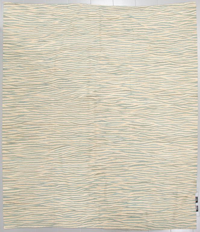 A flatweave, 280 x 263 cm.