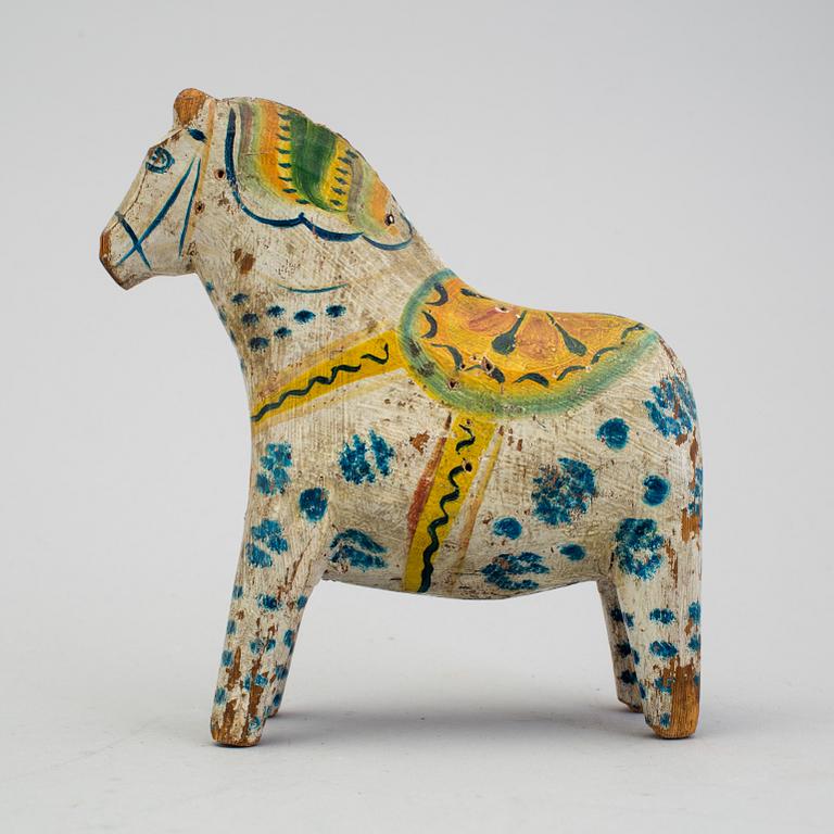 A painted folk art dala horse first half of the 20th century.