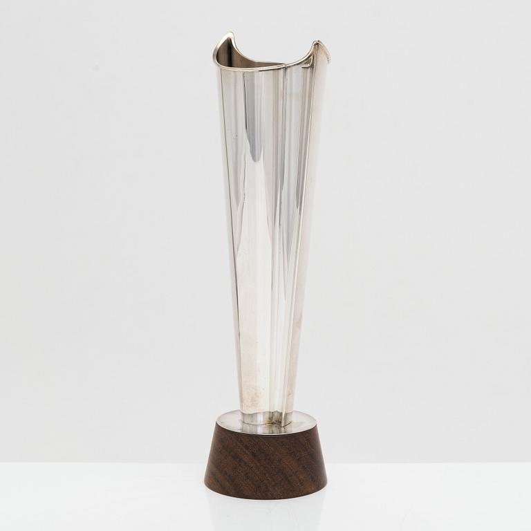 Tapio Wirkkala, a 'Liekki' (Flame) silver vase on a rosewood base, model TW 228, Kultakeskus, Hämeenlinna 1963.