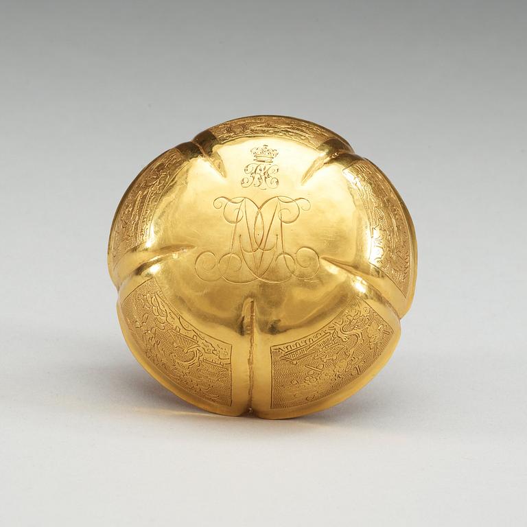 A engraved flower-shaped gold bowl, Qing dynasty, 18th Century.