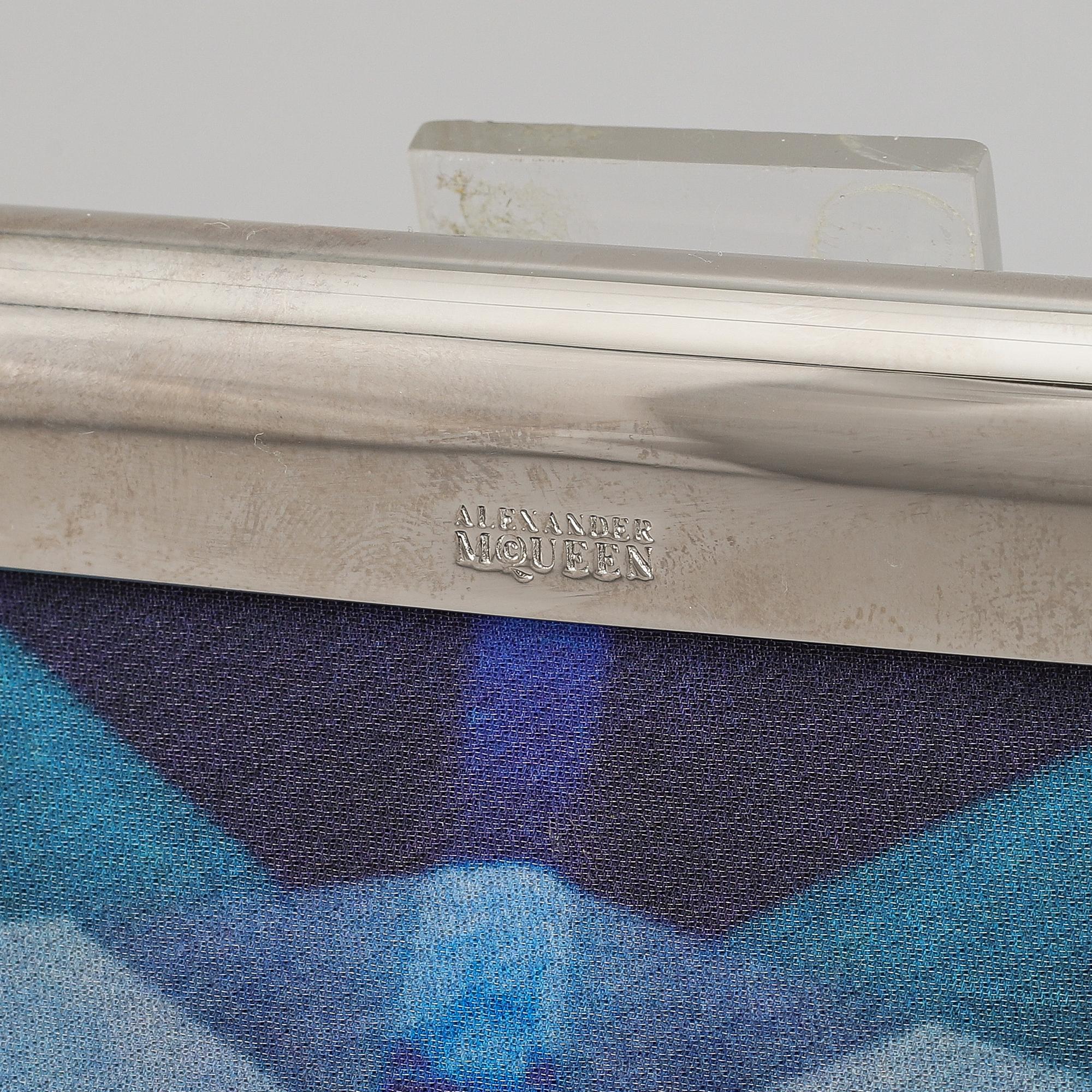 Alexander McQueen, a fabric clutch.
