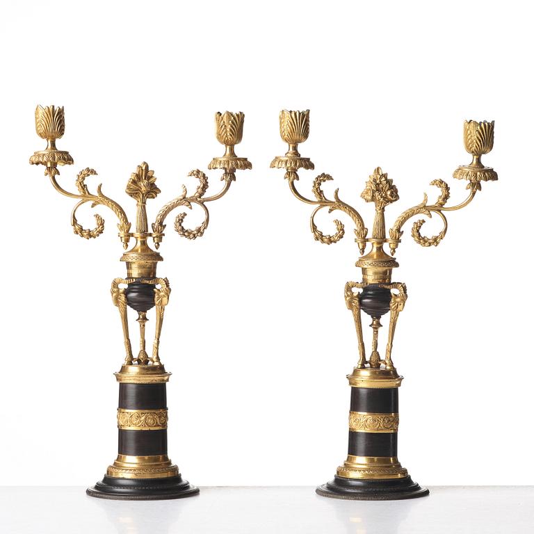 A pair of North European two-light candelabra, circa 1800.