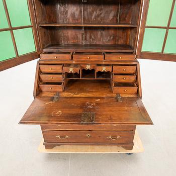 Slant-front secretary with a glazed section, 18th century.