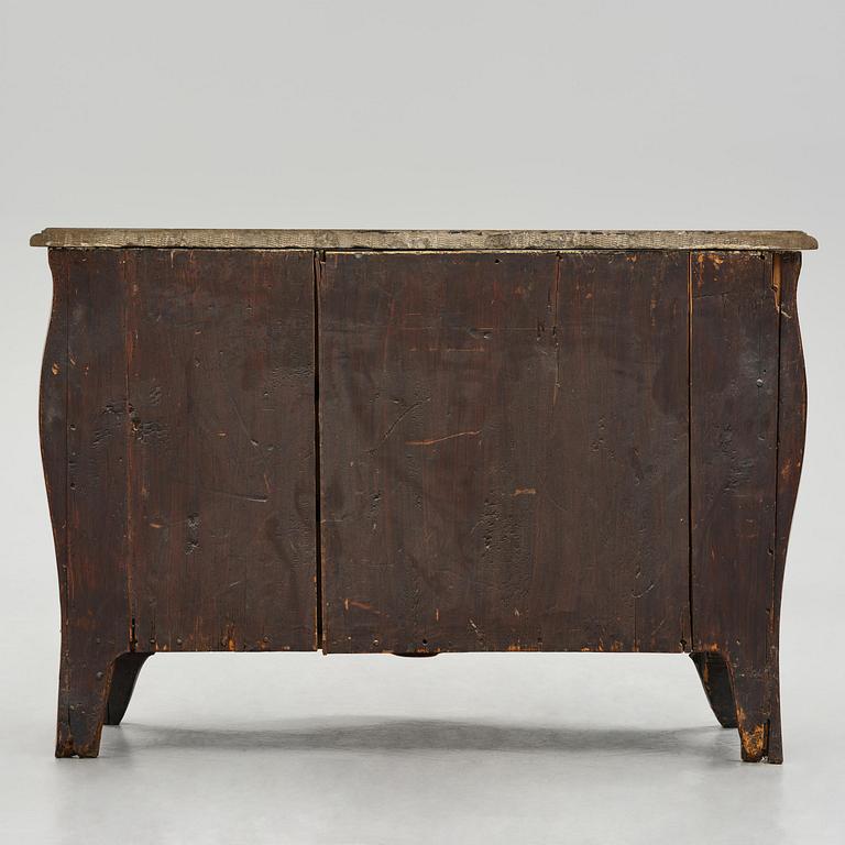 A rococo parquetry commode by C. G. Willkom (master in Stockholm 1763-65).