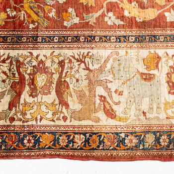 An antique silk Tabriz carpet, north west Persia, c 239 × 168 cm.