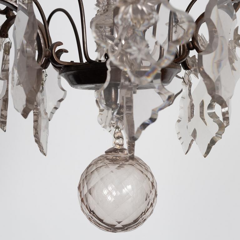 A Rococo style chandelier, early 20th century.