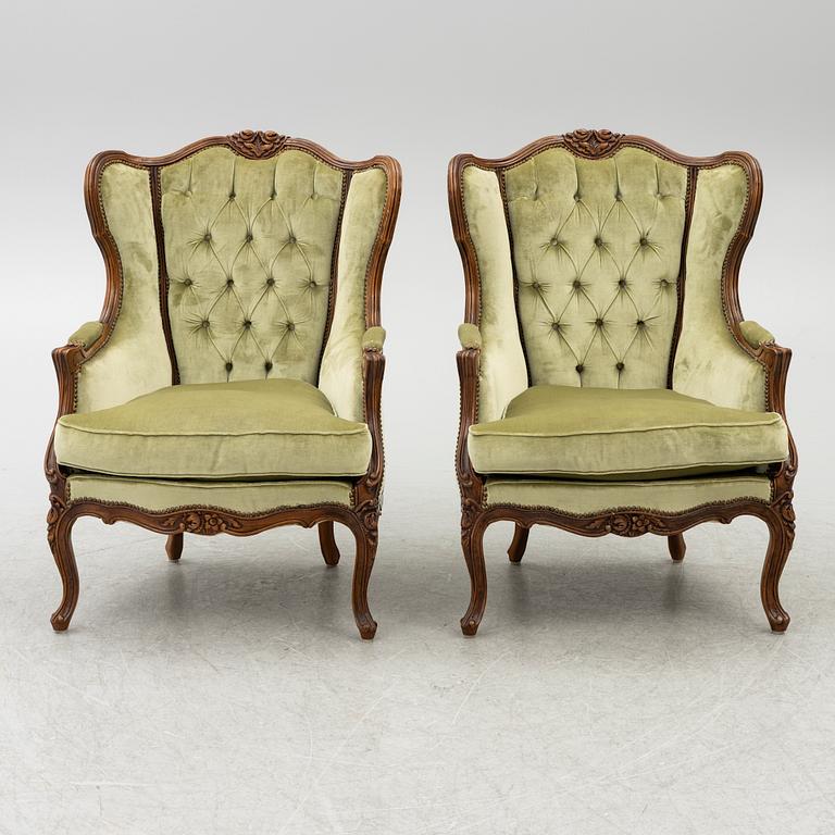 A pair of bergère armchairs, rococo-style, first half of te 20th century.