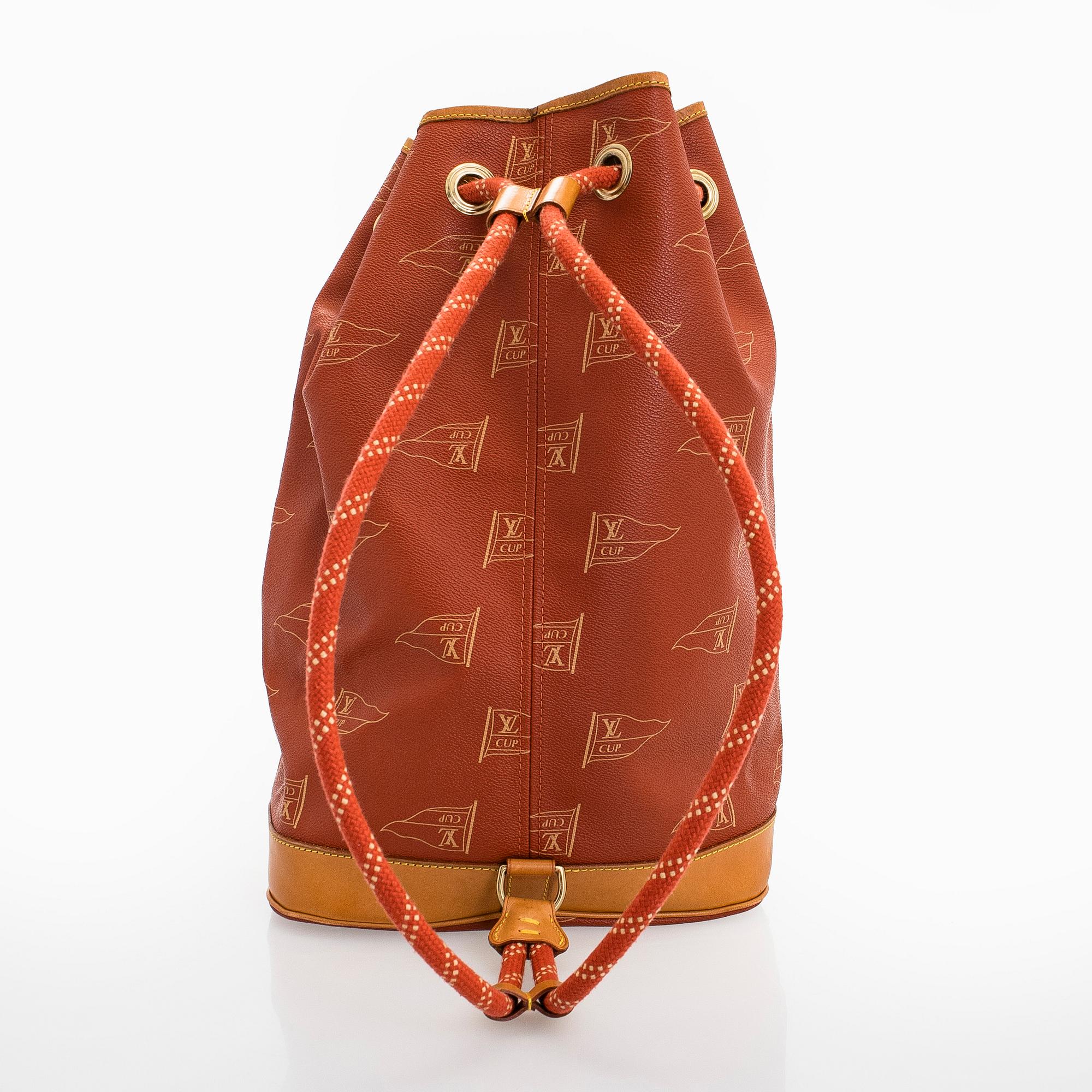 Louis Vuitton, a '1995 LV Cup St. Tropez Drawstring Backpack' bag.