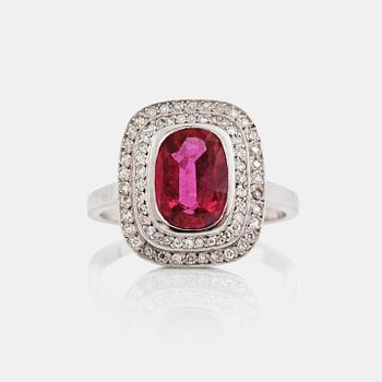 1222. A ruby, ca 2.50 cts, and diamond ring.