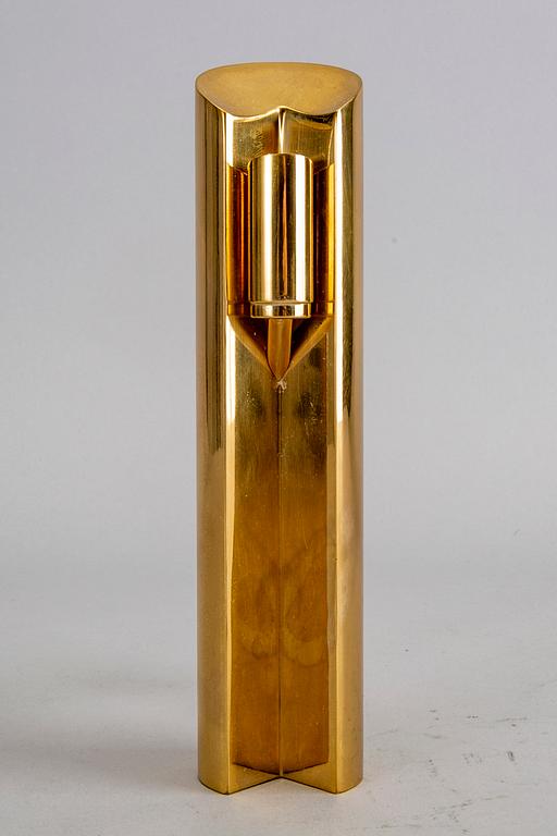 A Pierre Forssell brass candle stick for Skultuna.